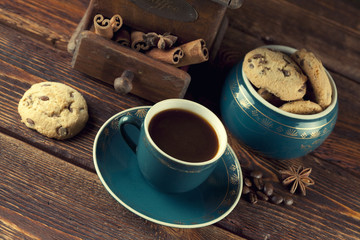 Coffee cup, cookies and old coffee grinder