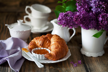 Croissants and jam for breakfast; selective focus
