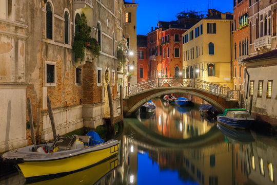 Night lateral canal and bridge in Venice, Italy