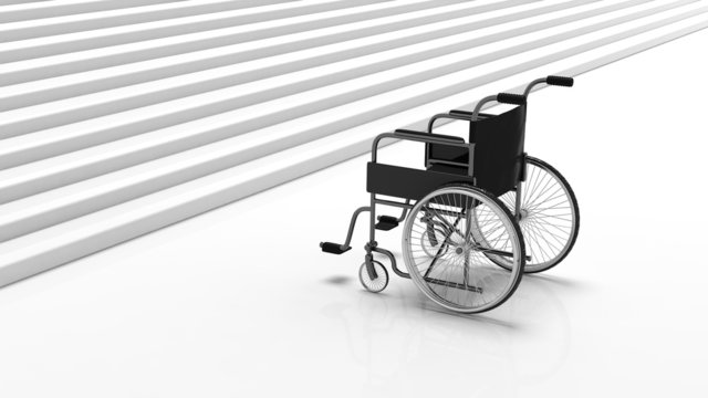 Black disability wheelchair near white stairs
