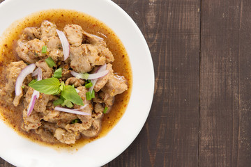 Thai food name is Grilled pork with spicy salad, Thai food.