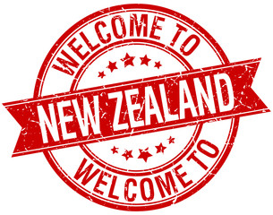 welcome to New Zealand red round ribbon stamp