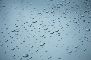 Close up water drop on body of car