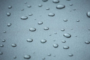 Close up water drop on body of car
