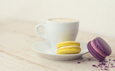 A cup of coffee "espresso" and  macaroon. toned photo