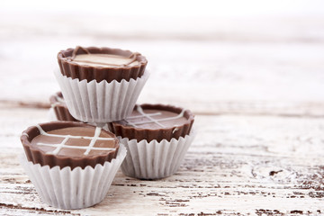 Dark chocolate on wooden background