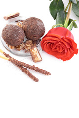 Cupcake with chocolate on wooden background