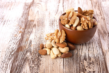 Mix nuts  on wooden background