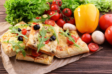 Delicious homemade pizza on table close-up