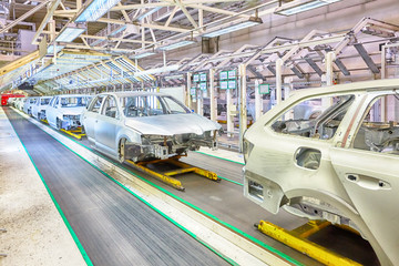 cars in a row at car plant