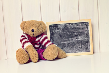 teddy bear with blackboard - greeting card background