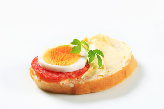 Bread with salami and egg