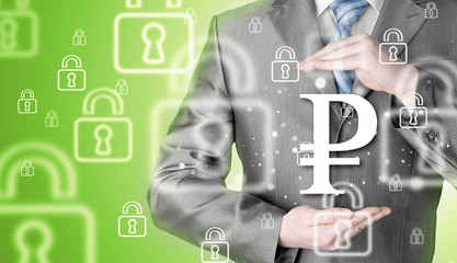 businessman protecting ruble  symbol