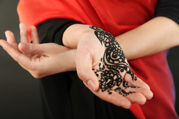 Image of henna on female hand, closeup