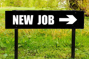 NEW JOB written on directional black metal sign