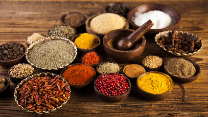 Wooden table of colorful spices