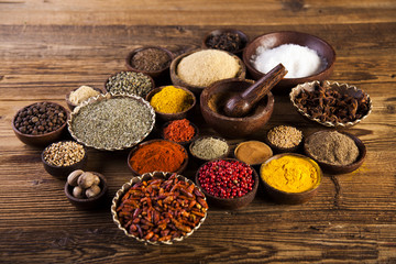 Wooden table of colorful spices