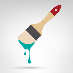 Paint brush with wooden handle and dripping paint