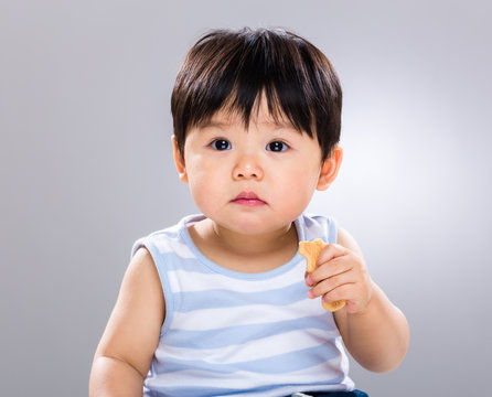 Baby Boy Having His Finger Food