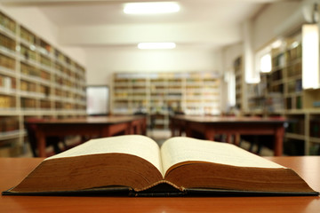 Open book in old library
