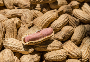 Many peanuts in shells, one upon the other