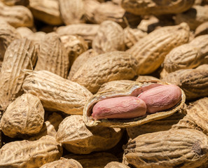 Many peanuts in shells, one upon the other