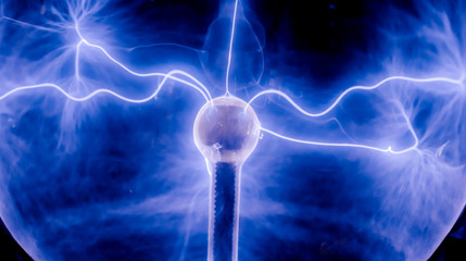 Intense electrical discharge and shine on a dark background