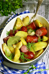 Potato baked with homemade sausage and onion.