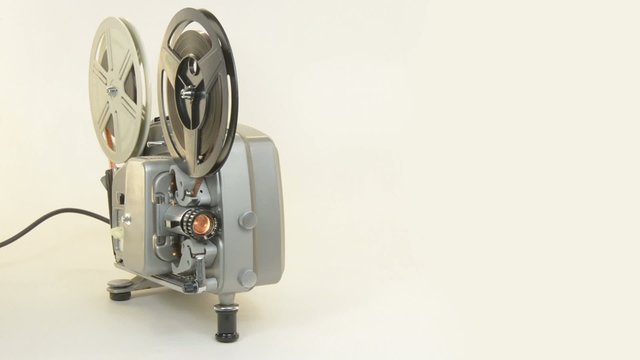 An antique super 8 projector running