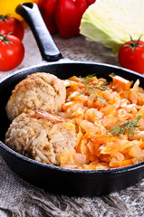 Meatballs with braised cabbage