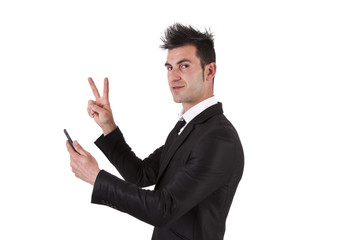 businessman with mobile symbol of Vitoria