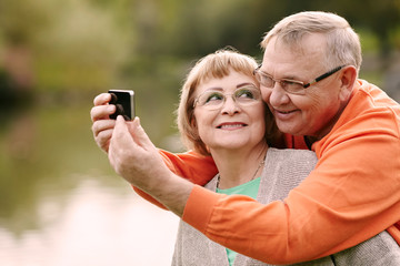 Mature couple taking selfie