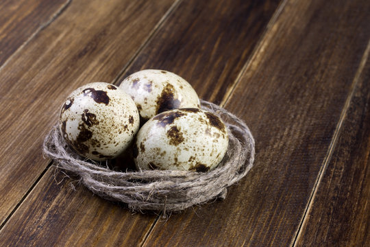 quail eggs on a wooden table