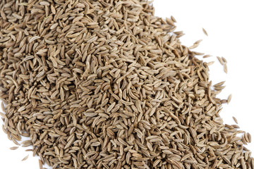 Cumin seeds on white background