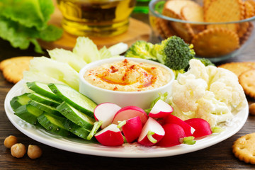 homemade hummus with raw vegetables.
