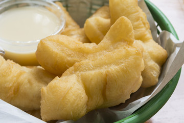 Breakfast in Thailand deep-fried doughstick and milk  background
