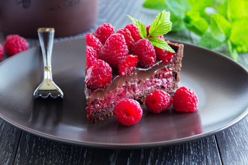 Chocolate tart with fresh raspberries.