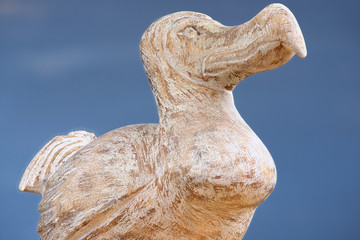 Wooden Dodo bird - typical souvenir from Mauritius island. Dodo is an extinct flightless bird that was endemic to the island of Mauritius. © Dmitry Chulov