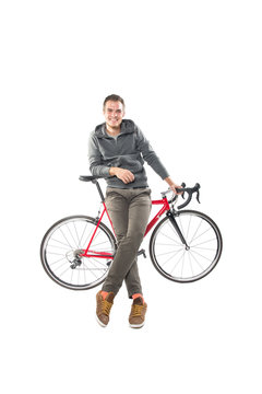 Young Male On Bicycle Isolated Over White Background