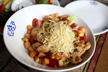Plate with caesar salad
