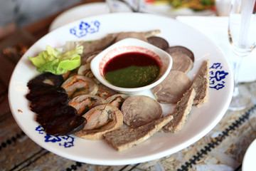 Plate with sliced meat