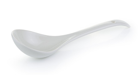 White empty ceramic spoon on white background