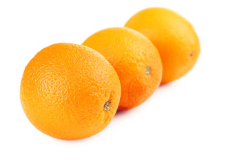 Ripe oranges isolated on white
