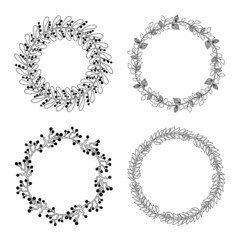 Set of round hand drawn floral frames on white background.