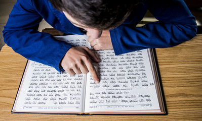a jewish scholar reading the bible © eranyardeni