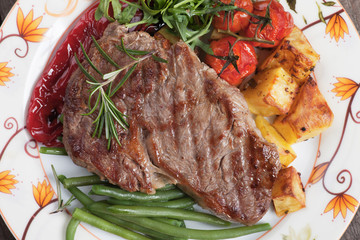 Beef steak with potato and vegetables