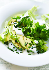 Avocado salad with yogurt dressin and black sesame seeds