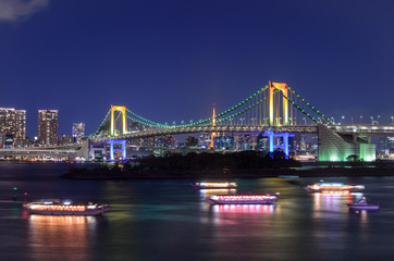 Fototapeta na wymiar Evening View of Tokyo Skyline, Rainbow Bridge, and Tokyo Tower
