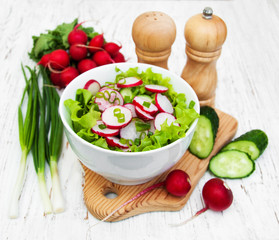 Spring salad with cucumbers and radish