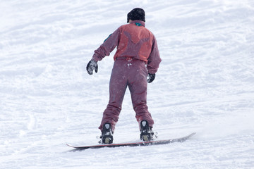 Fototapeta na wymiar snowboarder snowboarding